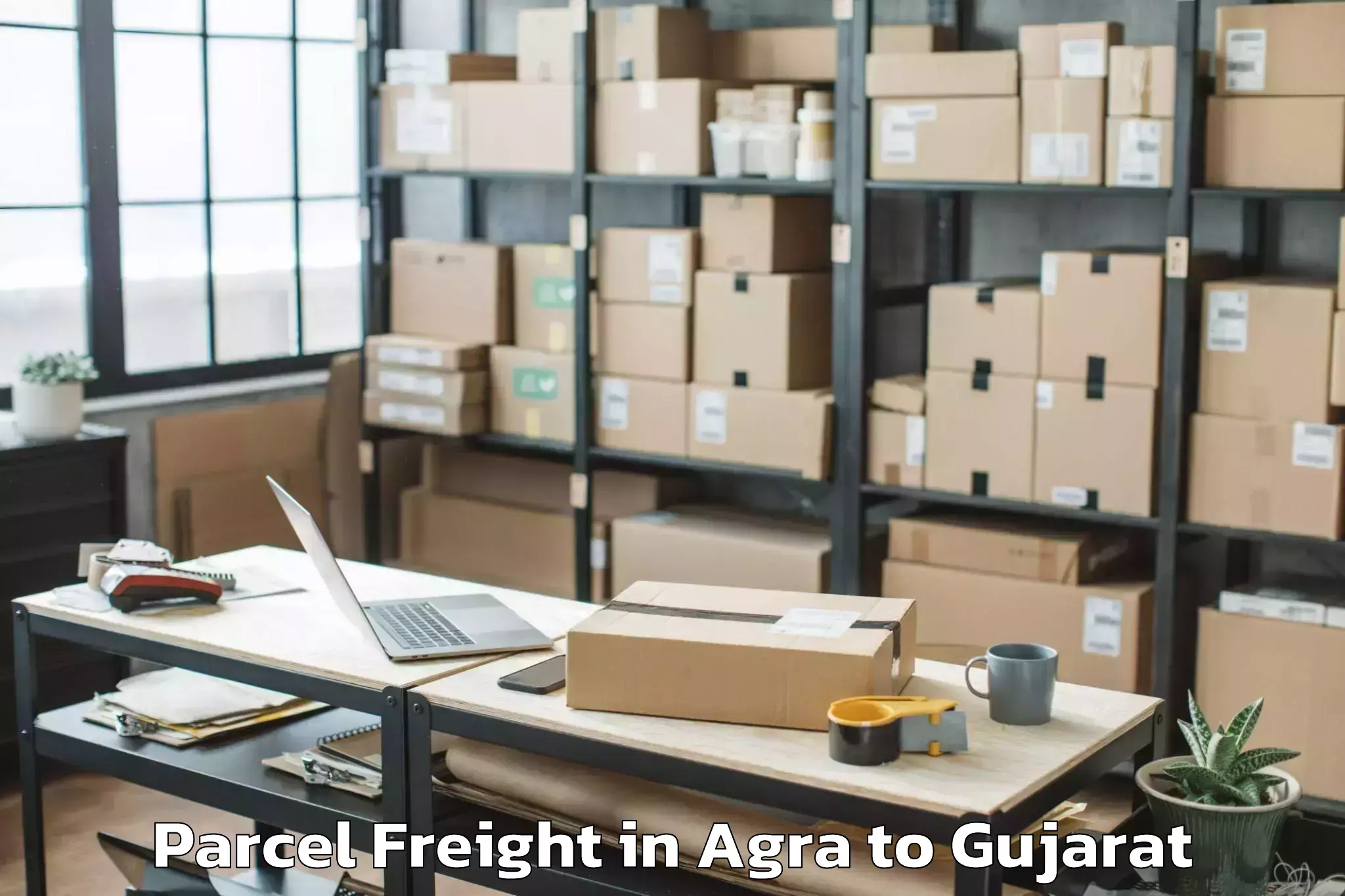 Agra to Jhalod Parcel Freight Booking